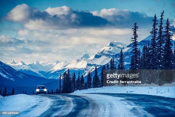 roadtrip on icefields parkway in banff national park canada - winter road stock pictures, royalty-free photos & images