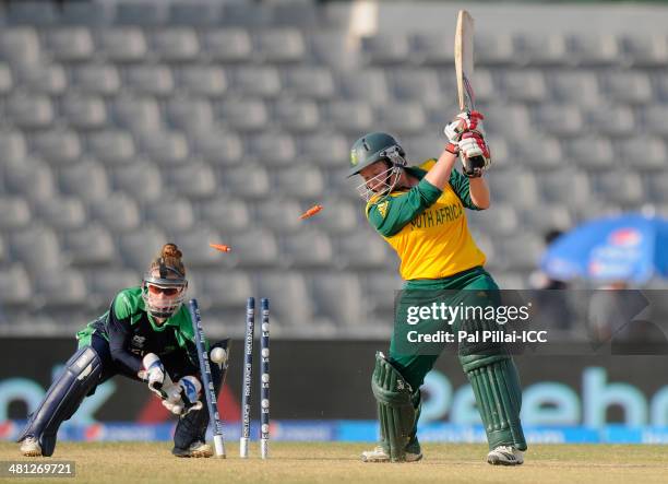 Lizelle Lee of South Africa gets bowled out by Isobel Joyce captain of Ireland during the ICC Women's world twenty20 match between South Africa Women...