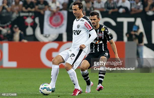 Uendel of Corinthians fights for the ball with Thiago Ribeiro of Atletico MG, during a match between Corinthians v Atletico MG of Brasileirao Series...
