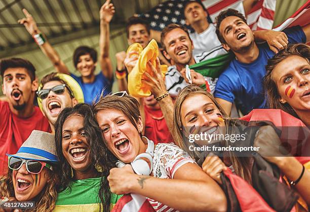 world unterstützer im fußballstadion - international soccer event stock-fotos und bilder