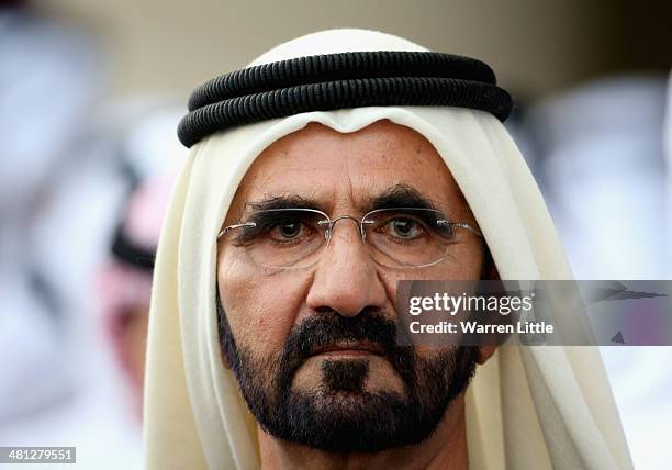 Portrait of Sheikh Mohammed bin Rashid Al Maktoum ruler of Dubai looks on during the Dubai World Cup at the Meydan Racecourse on March 29, 2014 in...