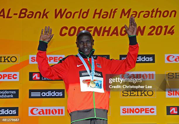Geoffrey Kipsang Kamworor of Kenya celebrates with his gold medal after winning the Men's Half Marathon during the IAAF/Al-Bank World Half Marathon...