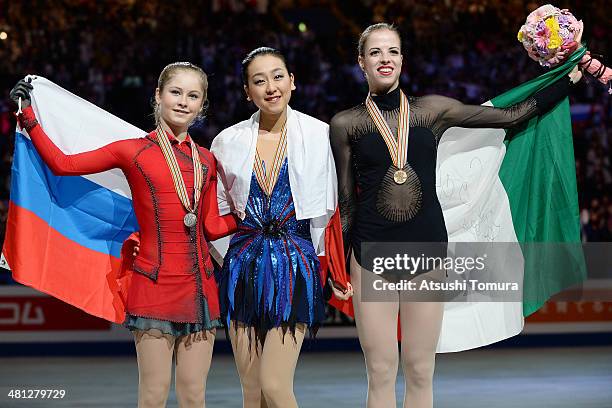 Julia Lipnitskaia of Russia, Mao Asada of Japan and Carolina Kostner of Italy pose with medal in the victory ceremony during ISU World Figure Skating...