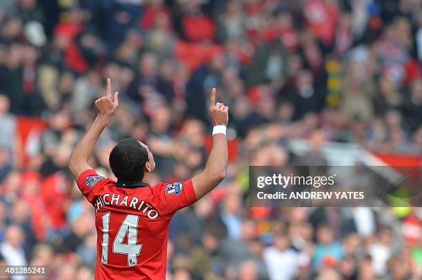 Manchester United's Mexican striker Javier Hernandez celebrates scoring his team's fourth goal during the English Premier League football match...