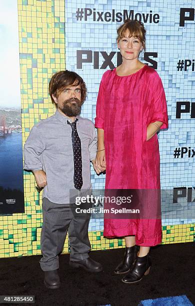 Actor Peter Dinklage and wife Erica Schmidt attend the "Pixels" New York premiere at Regal E-Walk on July 18, 2015 in New York City.