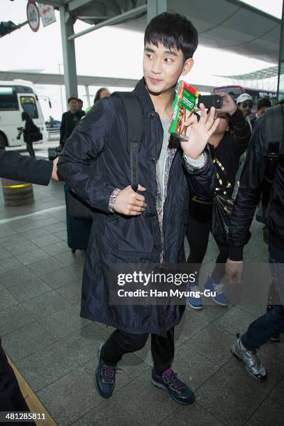 South Korean actor Kim Soo-Hyun is seen on departure at Incheon International Airport on March 29, 2014 in Incheon, South Korea.