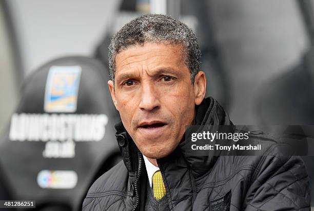 Chris Hughton, manager of Norwich City looks on during the Barclays Premier League match between Swansea City and Norwich City at Liberty Stadium on...
