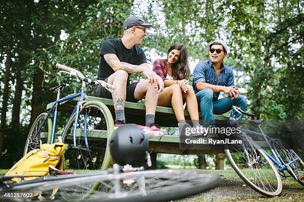 bike commuters in portland oregon - friends cycling stock pictures, royalty-free photos & images