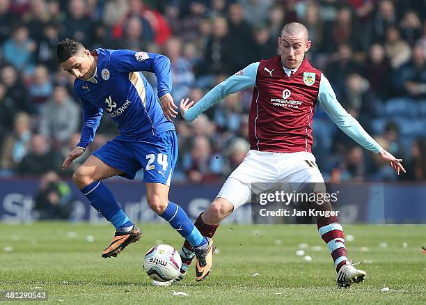 David Jones of Burnley battles with Anthony Knockaert of Leicester City during the Sky Bet Championship match between Burnley and Leicester City at...