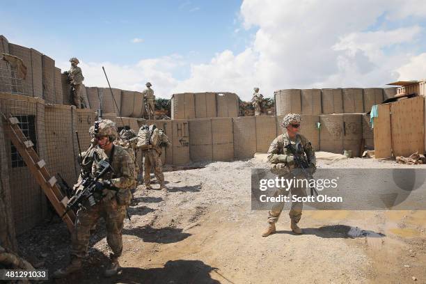 Soldiers with the U.S. Army's 2nd Battalion 87th Infantry Regiment, 3rd Brigade Combat Team, 10th Mountain Division set up a defensive position...