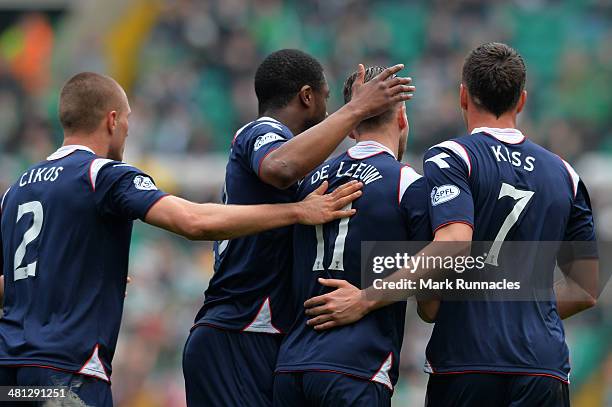 Melvin De Leeuw of Ross County celebrates his goal with his team mates during the Scottish Premier League match between Celtic and Ross County at...