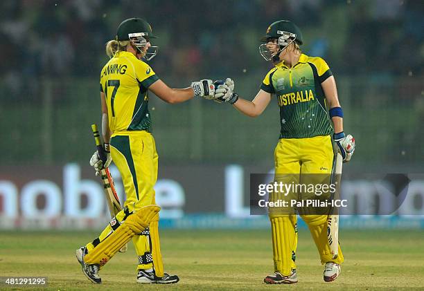 Elyse Villani of Australia and Meg Lanning of Australia punch gloves during the ICC Women's World Twenty20 match between Australia Women and Pakistan...