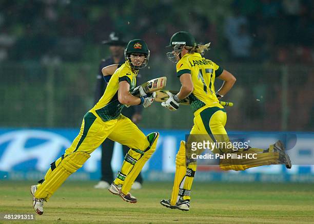 Elyse Villani of Australia and Meg Lanning of Australia run between the wickets during the ICC Women's World Twenty20 match between Australia Women...