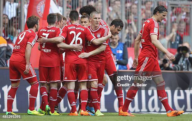 Players of Bayern Muenchen celebrate their third goal during the Bundesliga match between FC Bayern Muenchen and 1899 Hoffenheim at Allianz Arena on...