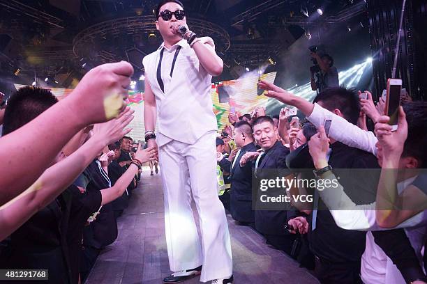 South Korean singer Psy, Park Jae-sang performs on the stage at a bar on July 18, 2015 in Hangzhou, China.