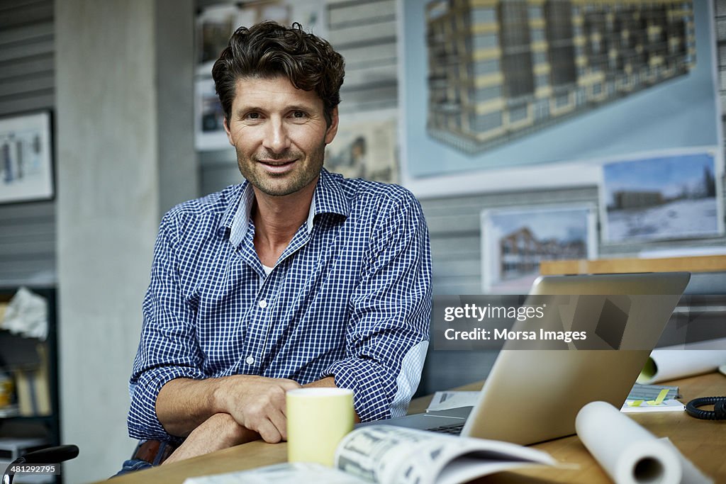 Portrait of architect at workstation