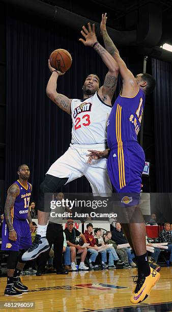 Markieth Cummings of the Bakersfield Jam goes to the basket against Shawne Williams of the Los Angeles D-Fenders during a D-League game on March 28,...