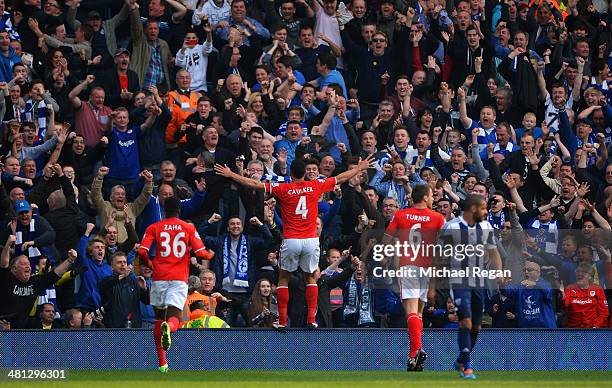 Steven Caulker of Cardiff City celebrates infront of the Cardiff City fans after scoring their second goal during the Barclays Premier League match...