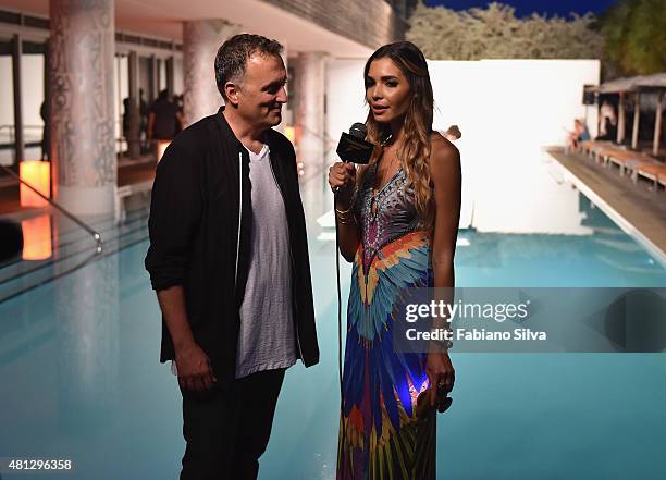 Style Blogger Jasmine Tosh interviews CEO Onis Design Group Jon Lewis at the Maxim Magazine Worldwide Swimwear Collection launch at SLS South Beach...