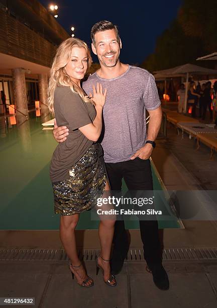 Eddie Cibrian and Singer LeAnn Rimes attend the Maxim Magazine Worldwide Swimwear Collection launch at SLS South Beach on July 18, 2015 in Miami,...