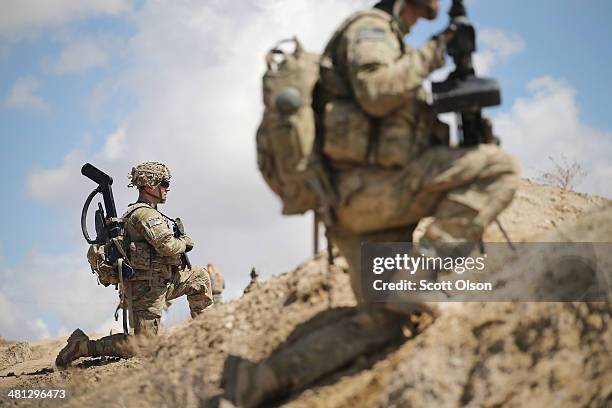 Nathan Harrell from Peru, New York with the U.S. Army's 2nd Battalion 87th Infantry Regiment, 3rd Brigade Combat Team, 10th Mountain Division patrols...