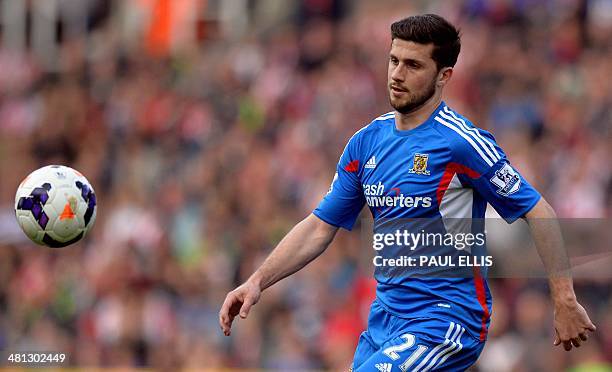 Hull City's Irish forward Shane Long controls the ball during the English Premier League football match between Stoke City and Hull City at the...