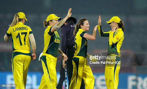Sarah Coyte of Australia celebrates the wicket of Sidra Amin of Paksitan during the ICC Women's world twenty20 match between Australia Women and...