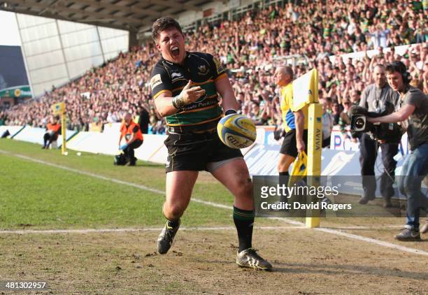 Ethan Waller of Northampton celebrates after scoring a try during the Aviva Premiership match between Northampton Saints and Leicester Tigers at...