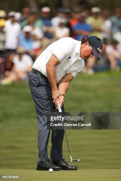 Phil Mickelson putts on the 13th during Round Three of the Valero Texas Open at TPC San Antonio AT&T Oaks Course on March 29, 2014 in San Antonio,...