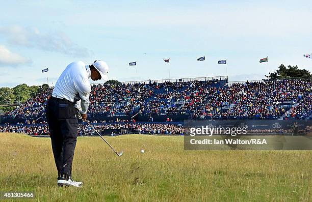 Tiger Woods of the United States hits an approach shot on the 17th hole during the second round of the 144th Open Championship at The Old Course on...