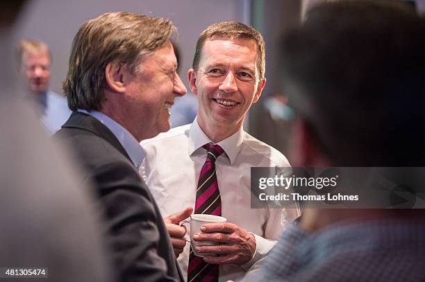 Bernd Lucke , former co-head of the Alternative fuer Deutschland political party, speaks with Joern Kruse during a meeting with other former party...