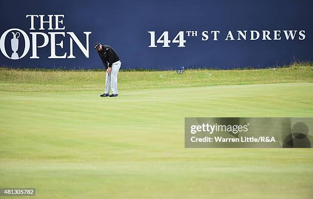 Jason Day of Australia putts on the first green during the third round of the 144th Open Championship at The Old Course on July 19, 2015 in St...