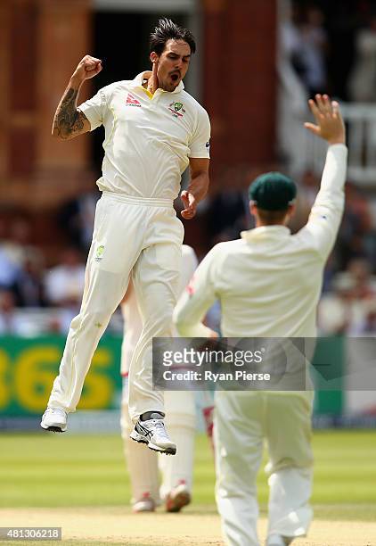 Mitchell Johnson of Australia celebrates after taking the wicket of Alastair Cook of England during day four of the 2nd Investec Ashes Test match...