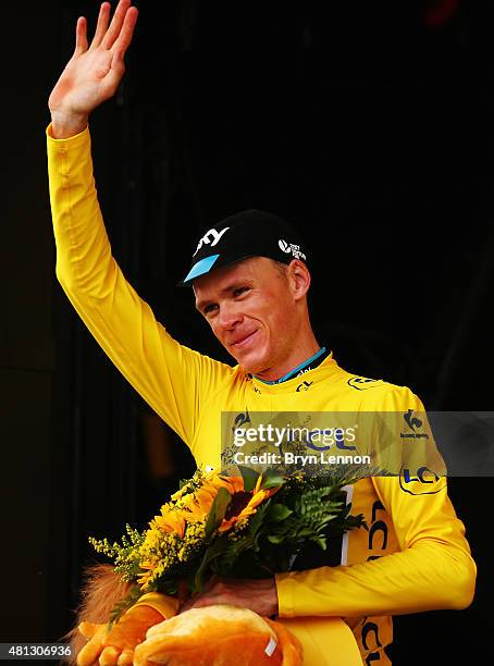 Chris Froome of Great Britain and Team Sky celebrates retaining the overall leaders yellow jersey at the finish of Stage 15 of the Tour de France, a...