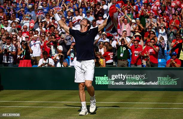 Andy Murray of Great Britain celebrates after defeating Gilles Simon of France on Day Three of The World Group Quarter Final Davis Cup match between...