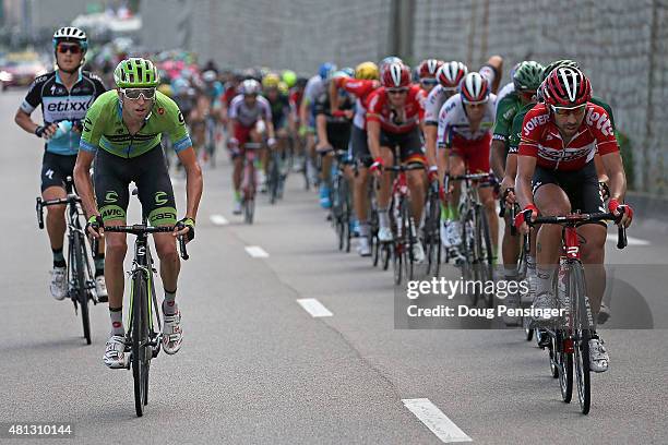 Matteo Trentin of Italy riding for Etixx-QuickStep and Ryder Hesjedal of Canada riding for Cannondale-Garmin are the last two riders of the breakaway...