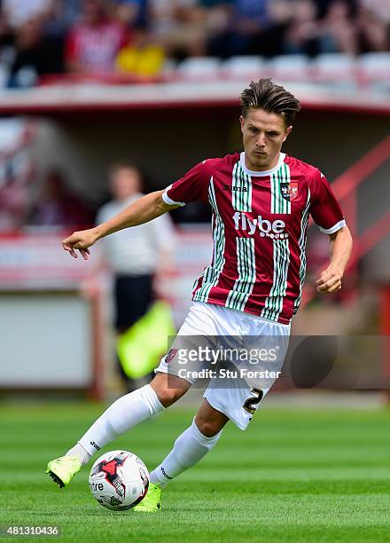 Tom Nichols of Exeter in action during the Pre season friendly match between Exeter City and AFC Bournemouth at St James Park on July 18, 2015 in...