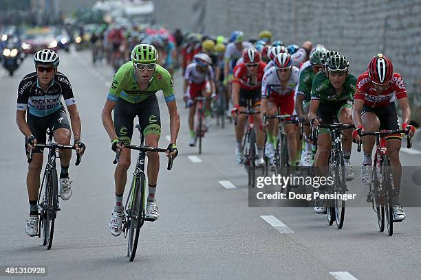 Matteo Trentin of Italy riding for Etixx-QuickStep and Ryder Hesjedal of Canada riding for Cannondale-Garmin are the last two riders of the breakaway...