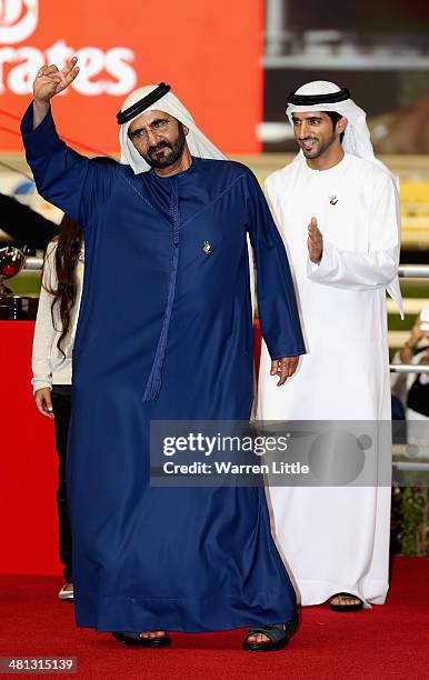Sheikh Mohammed bin Rashid Al Maktoum, Ruler of Dubai and Vice President of the UAE rejoices after winning the Dubai World Cup with his horse African...
