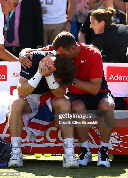 Andy Murray of Great Britain breaks down following his victory against Gilles Simon of France on Day Three of The World Group Quarter Final Davis Cup...