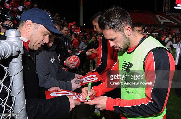 Danny Ings of Liverpool signs autographs for fans after a training session at Coopers Stadium on July 19, 2015 in Adelaide, Australia.