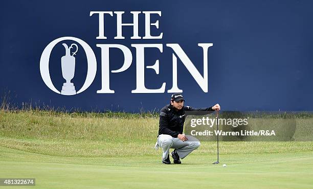 Jason Day of Australia lines up his putt on the first green during the third round of the 144th Open Championship at The Old Course on July 19, 2015...