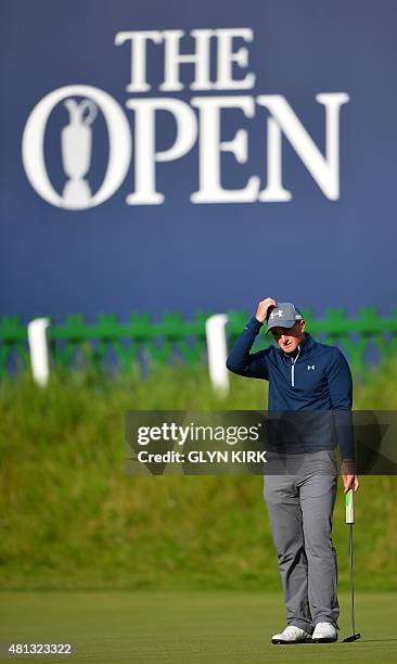 Ireland's amateur golfer Paul Dunne waits on the 18th green during his third round 66, on day four of the 2015 British Open Golf Championship on The...