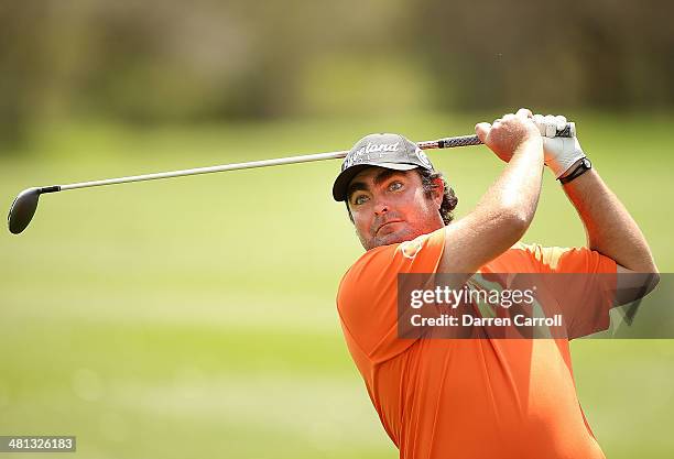 Steven Bowditch plays his shot on the 8th during Round Three of the Valero Texas Open at TPC San Antonio AT&T Oaks Course on March 29, 2014 in San...