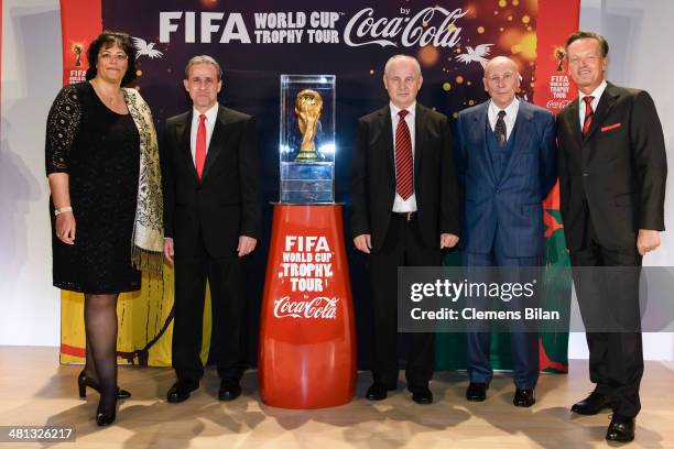 Barbara Koerner , Pierre Littbarski, Bernd Hoelzenbein, Horst Eckel and Hendrik Steckhan pose with the trophy during a photocall at the Gala Night of...