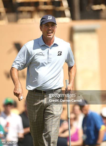 Matt Kuchar birdies on the 18th during Round Three of the Valero Texas Open at TPC San Antonio AT&T Oaks Course on March 29, 2014 in San Antonio,...