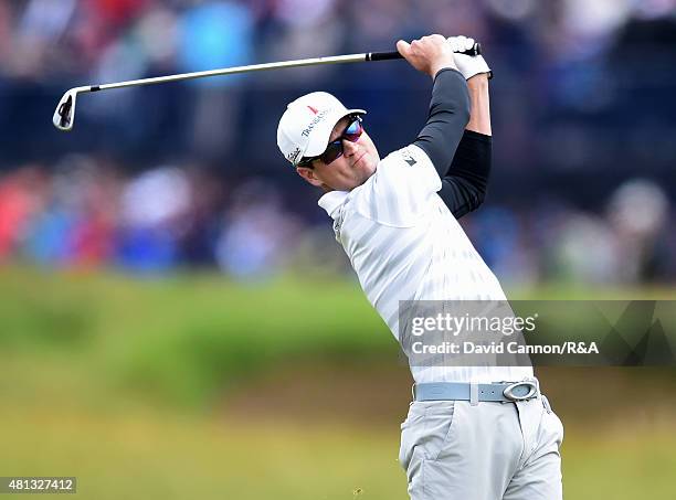 Zach Johnson of the United States hits his second shot on the fifth hole during the third round of the 144th Open Championship at The Old Course on...