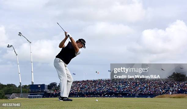 Retief Goosen of South Africa hits an approach shot on the 17th hole during the third round of the 144th Open Championship at The Old Course on July...