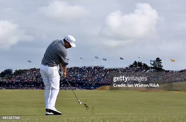 Luke Donald of England htis his second shot on the 17th hole during the third round of the 144th Open Championship at The Old Course on July 19, 2015...