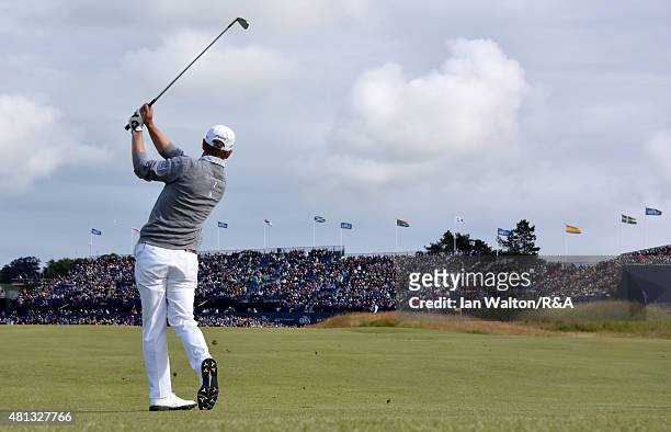 Luke Donald of England htis his second shot on the 17th hole during the third round of the 144th Open Championship at The Old Course on July 19, 2015...